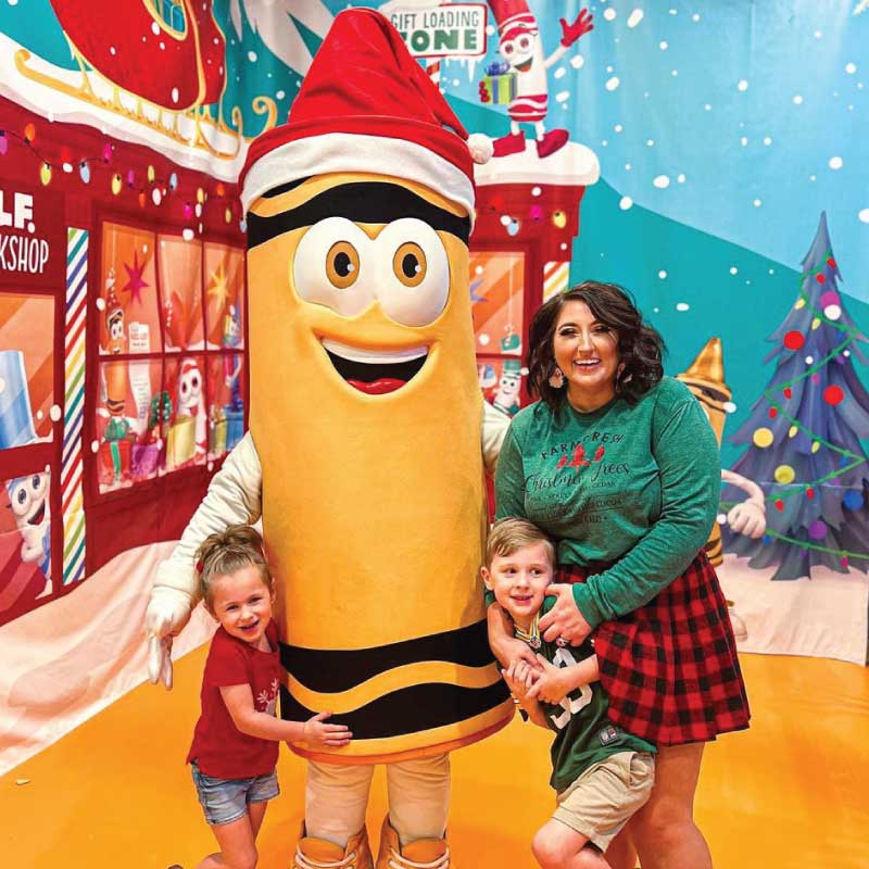 Family with holiday crayon character