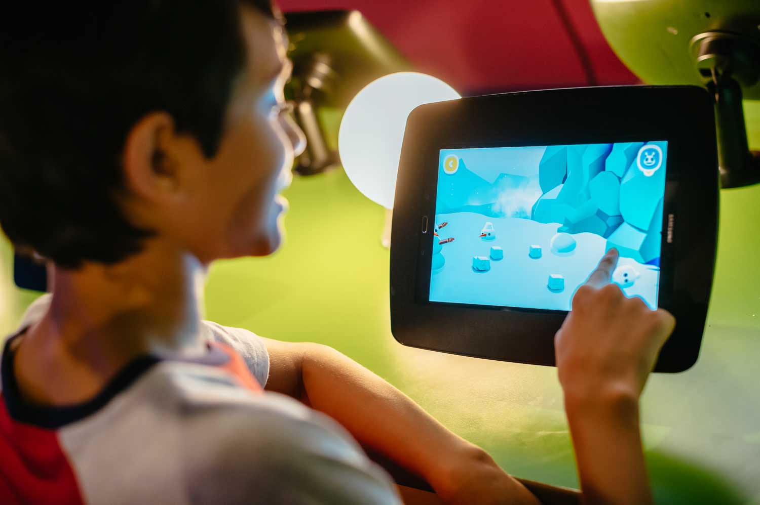 Child playing in the Create & Play app on a tablet