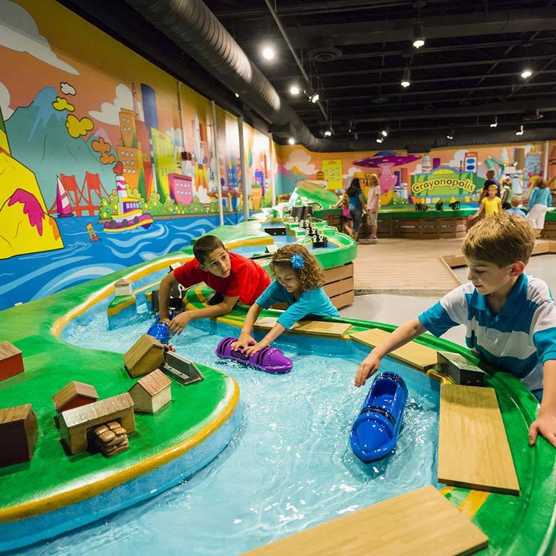 Kids with crayon boats