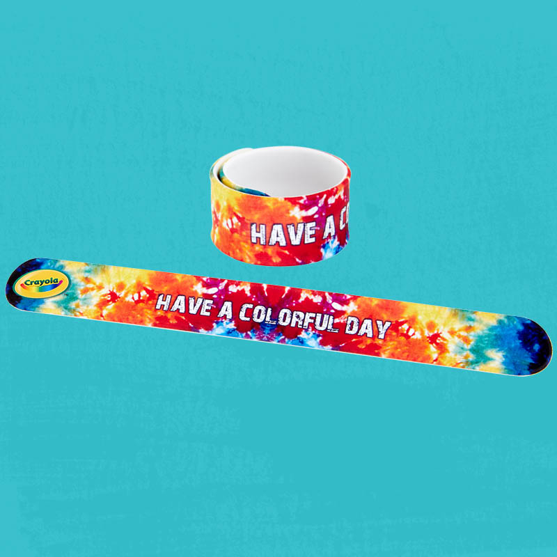 Tie Dye slap bracelet on a blue background