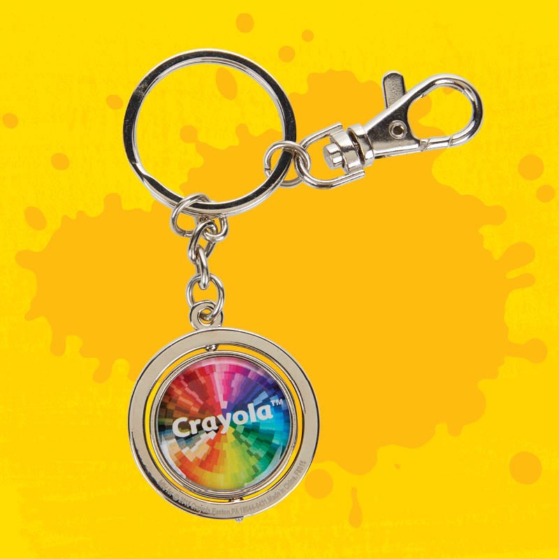 Colorwheel spinner keychain on a yellow background
