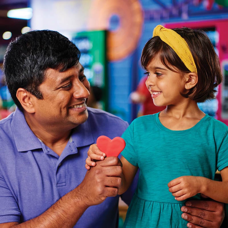 Dad and child at Crayola Experience