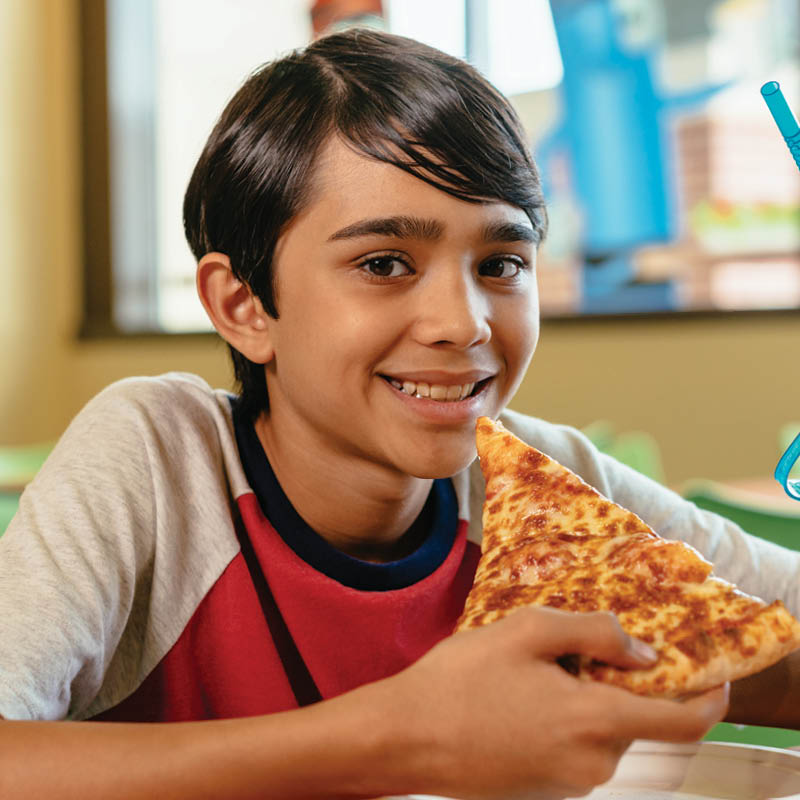 Guest enjoying pizza