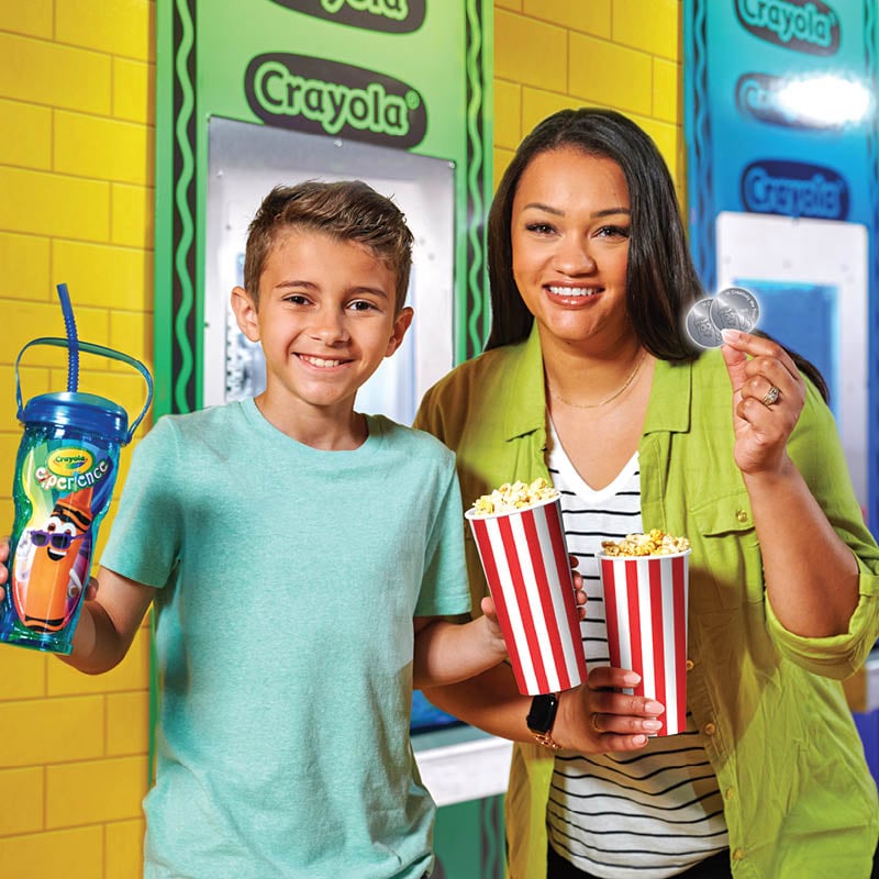 Mother and son with Fun Boost food and tokens