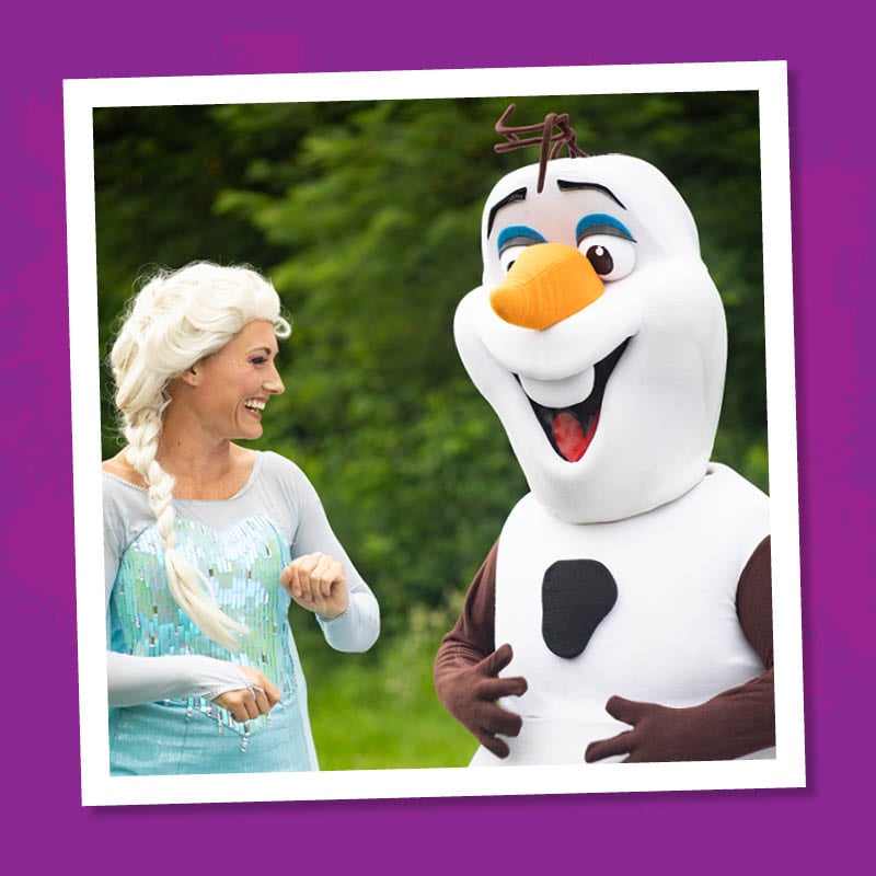 Photo of an ice princess and her frozen friend on a purple background