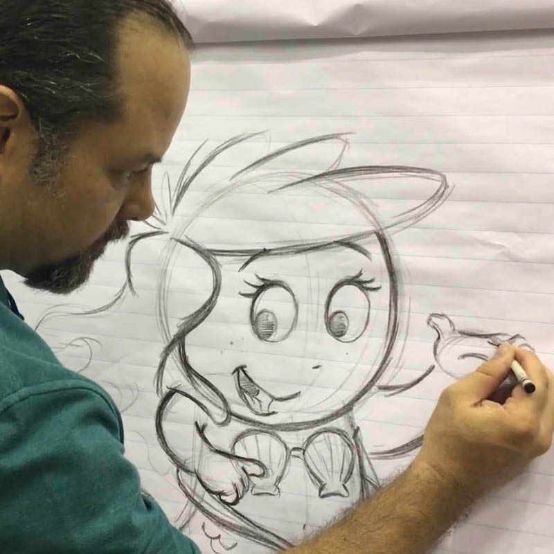 Illustrator drawing a mermaid
