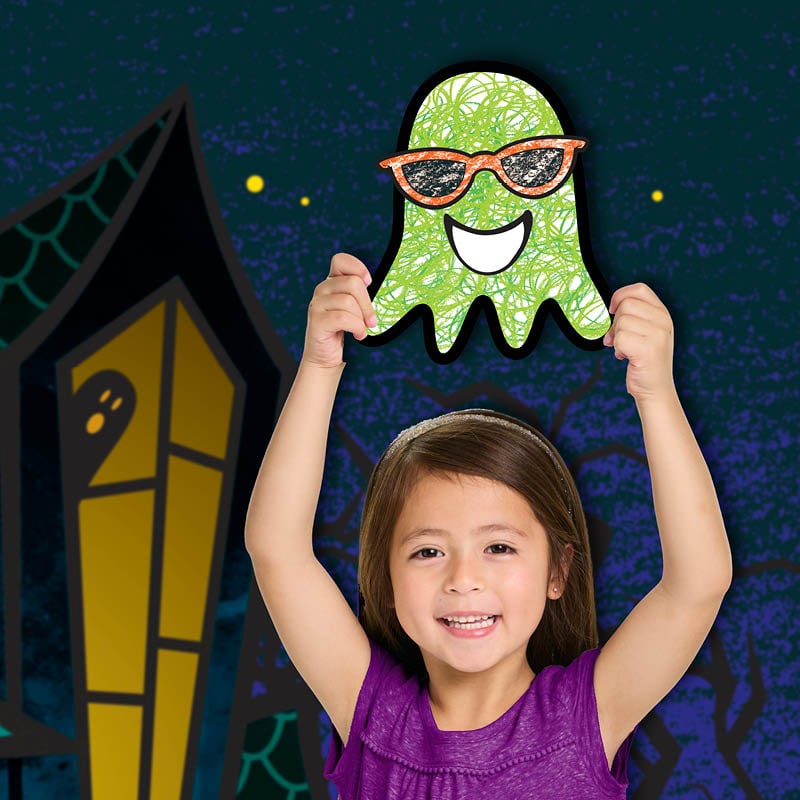 Child holding up a ghost craft