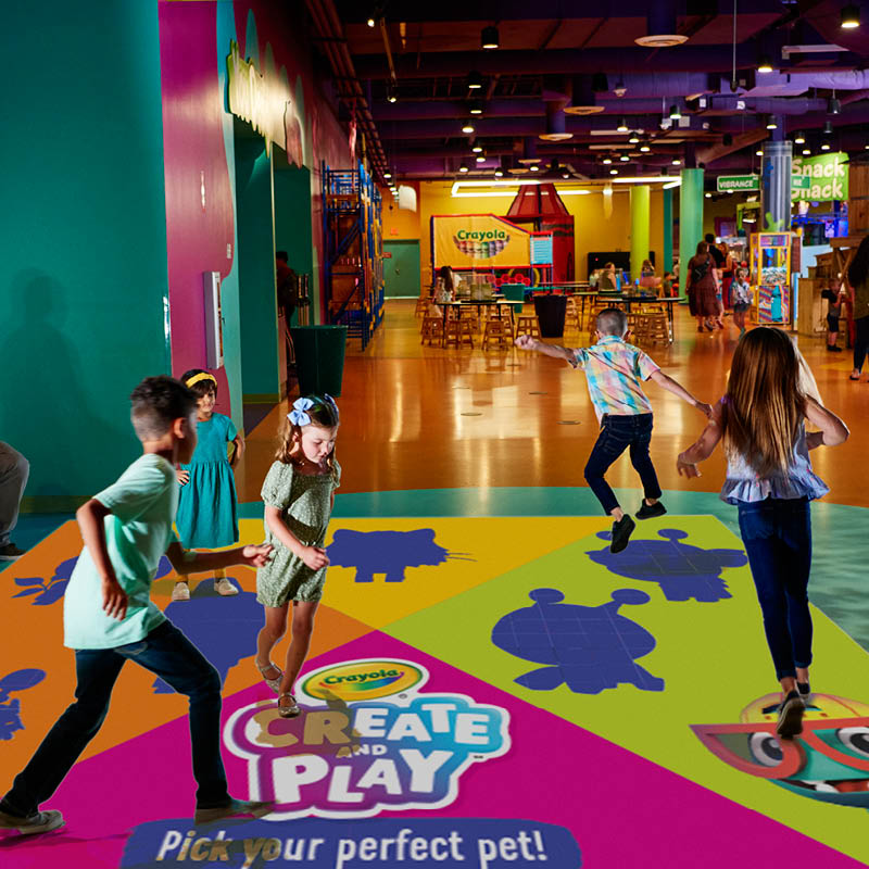 Kids playing on an interactive floor