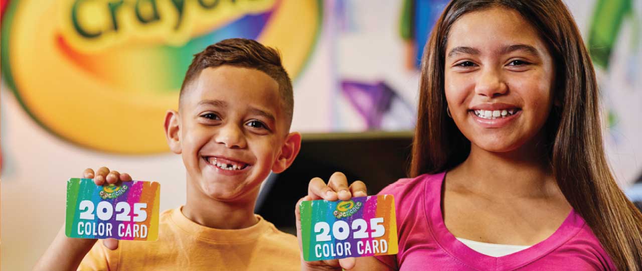 Two kids holding out 2025 Color Cards