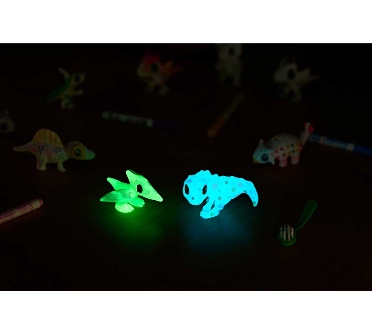 scribble scrubbie pets dinosaur glow pack. two dinosaurs glowing in the dark.