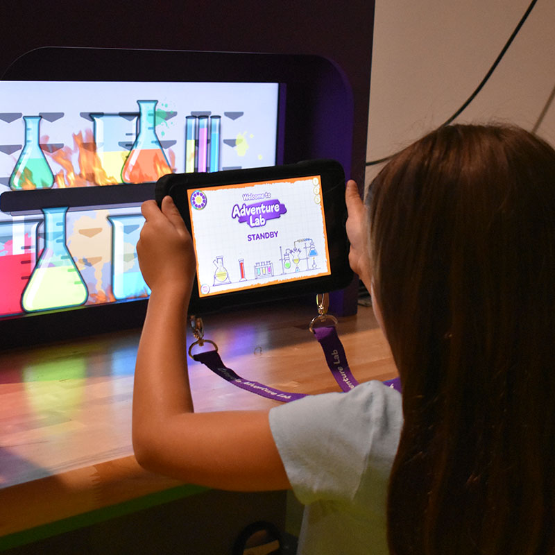 Girl playing in Adventure Lab at Crayola Experience